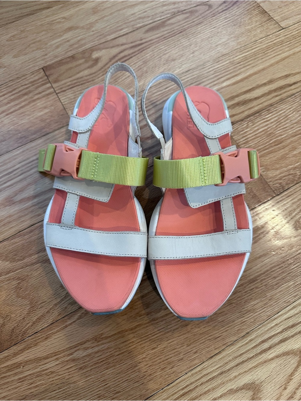 SOREL Kinetic Impact Sling Sandals in the "Chalk & Paradiso Peach" women size 7